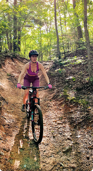 Medical Solutions traveler biking a ridge