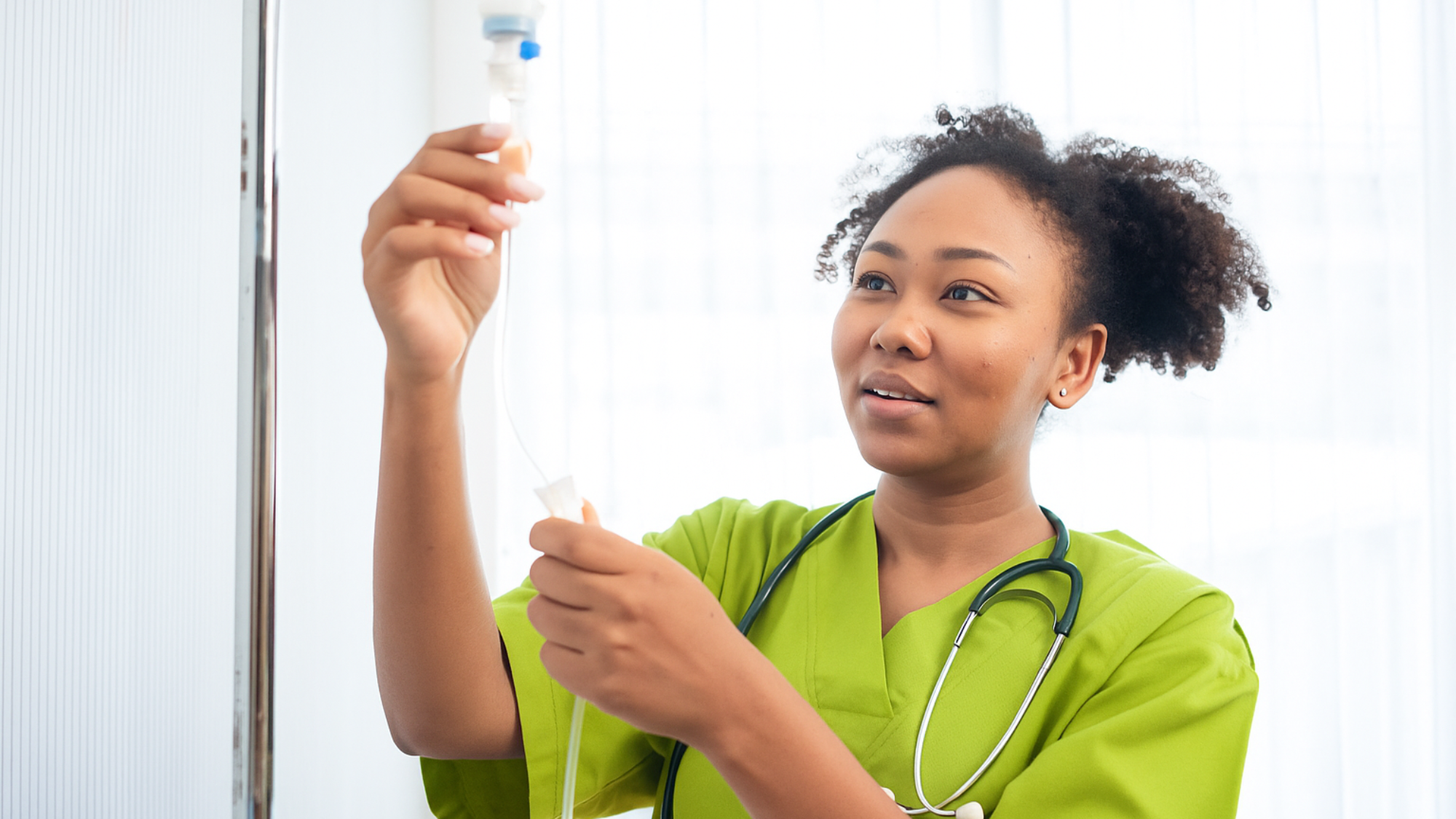 nurse in lime green scrubs checking an iv