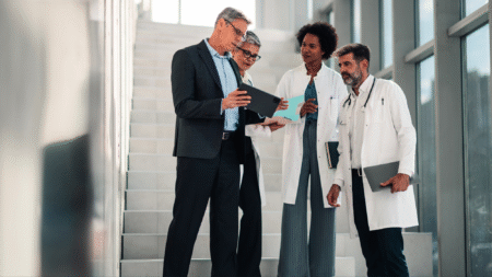 doctors-and-professionals-looking-at-ipad